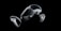 A set of virtual reality equipment, including a headset and two handheld controllers, displayed against a black background. The headset has a sleek, modern design with a glossy surface, while the controllers feature several buttons and joysticks.