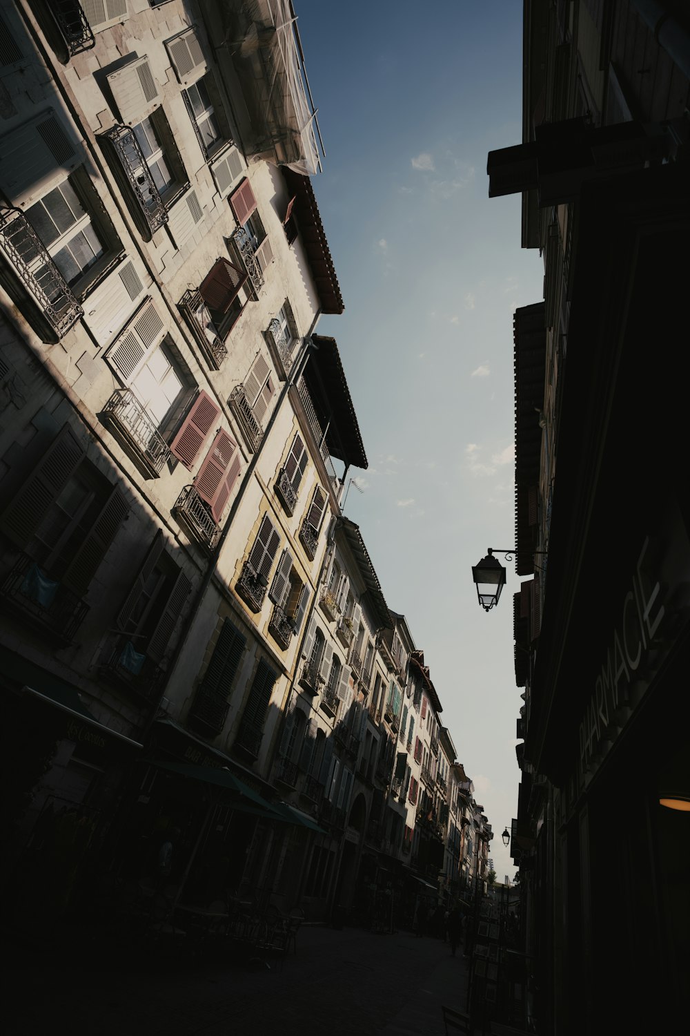 a street with buildings and a street light