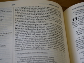 A close-up view of an open Bible showing text from the Old Testament. The visible pages are numbered 578 and 579. The text includes verses that appear to be part of a narrative or instruction, with some phrases capitalized for emphasis.