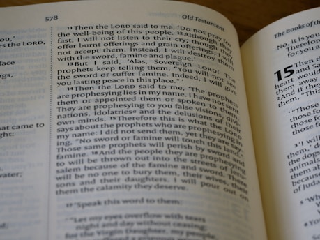 A close-up view of an open Bible showing text from the Old Testament. The visible pages are numbered 578 and 579. The text includes verses that appear to be part of a narrative or instruction, with some phrases capitalized for emphasis.