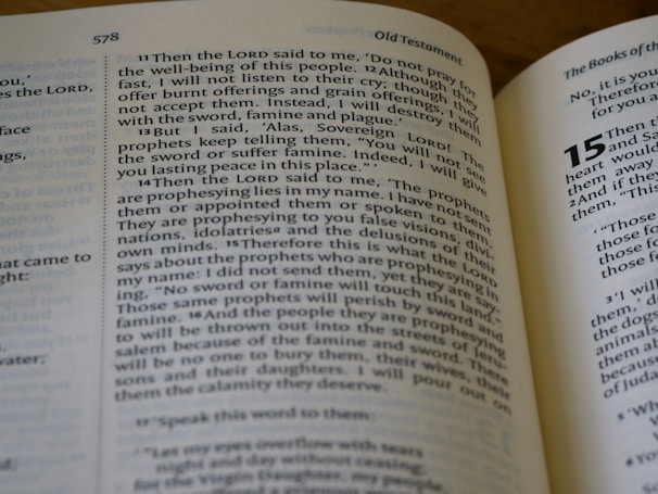 A close-up view of an open Bible showing text from the Old Testament. The visible pages are numbered 578 and 579. The text includes verses that appear to be part of a narrative or instruction, with some phrases capitalized for emphasis.