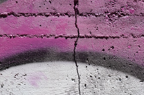Close-up of a freshly painted concrete wall with vibrant, weather-resistant coating.