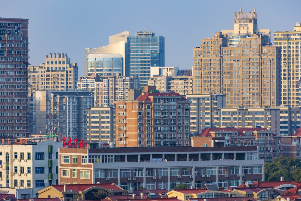 a view of a city with tall buildings