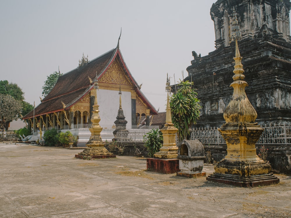 a group of statues in front of a building