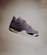 Side view of a sleek injection-molded shoe showcasing its seamless design.