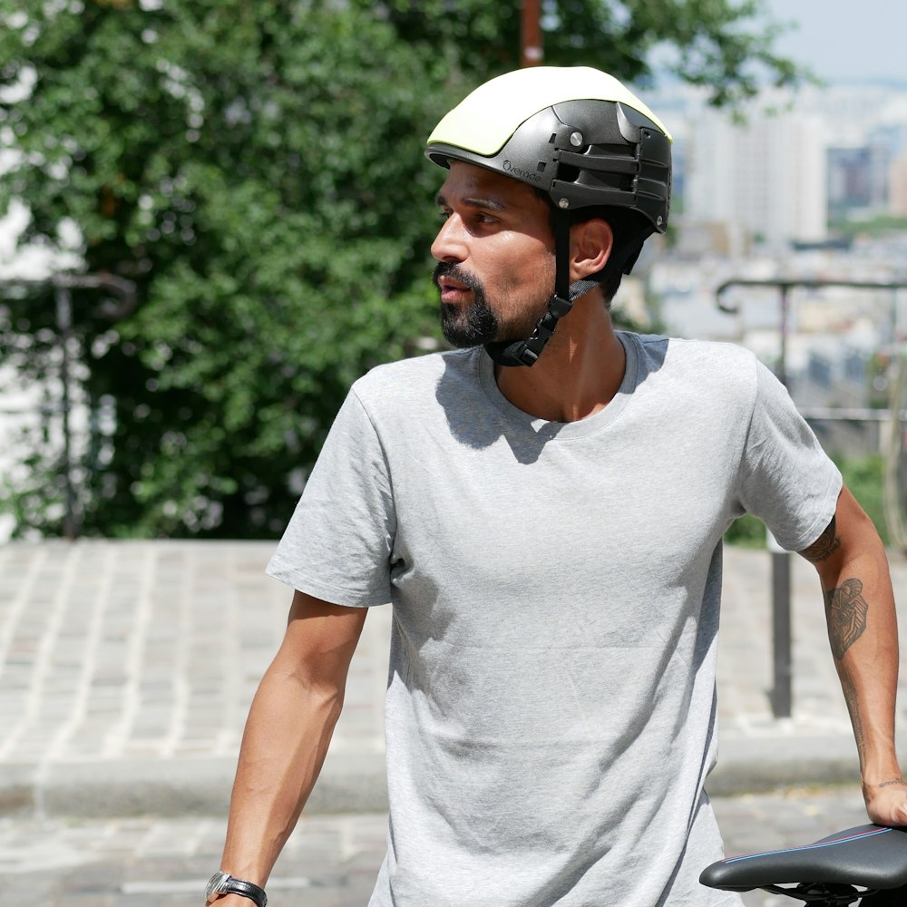 a man with a helmet on riding a skateboard