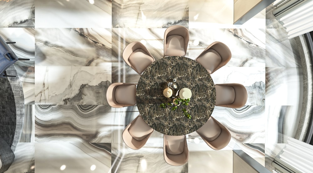 an aerial view of a table and chairs