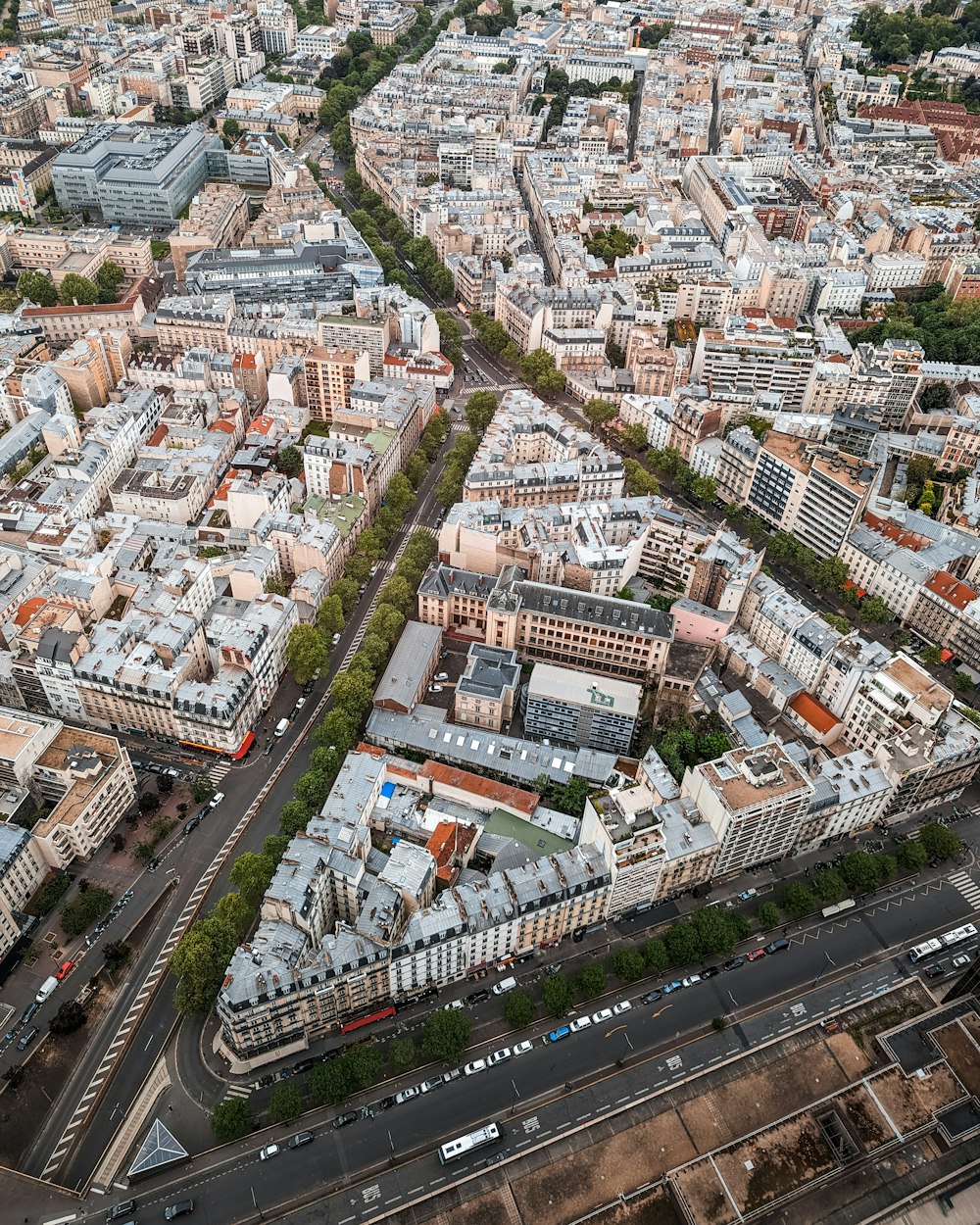 an aerial view of a city with lots of tall buildings