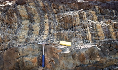 Close-up of a geophysical instrument measuring underground mineral deposits.
