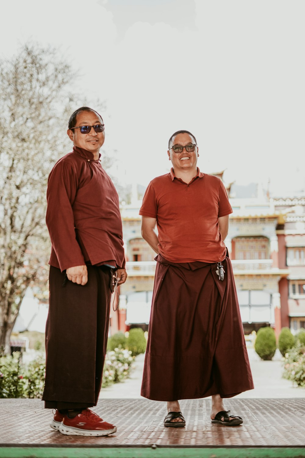 a couple of men standing next to each other