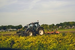 A Valtra tractor working on a farm.