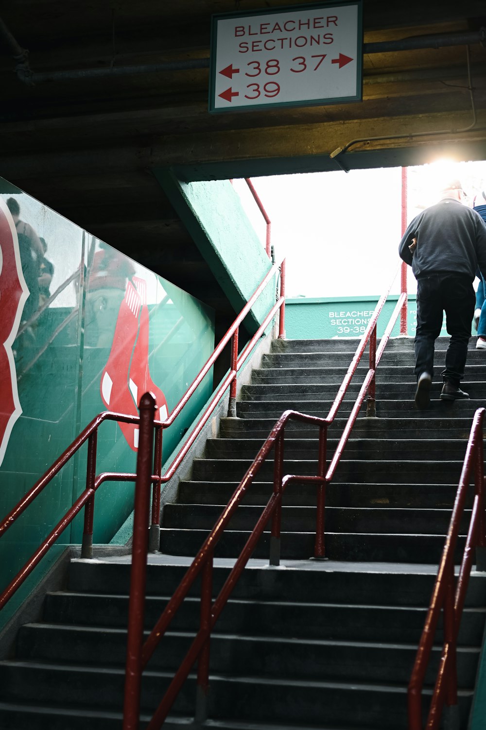 a man walking up a flight of stairs