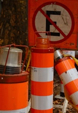 Team coordinating traffic control setup with cones and signage on a highway.
