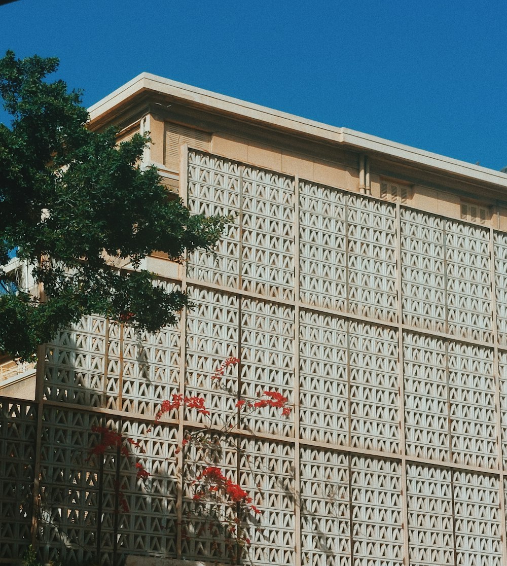 a building with a tree in front of it