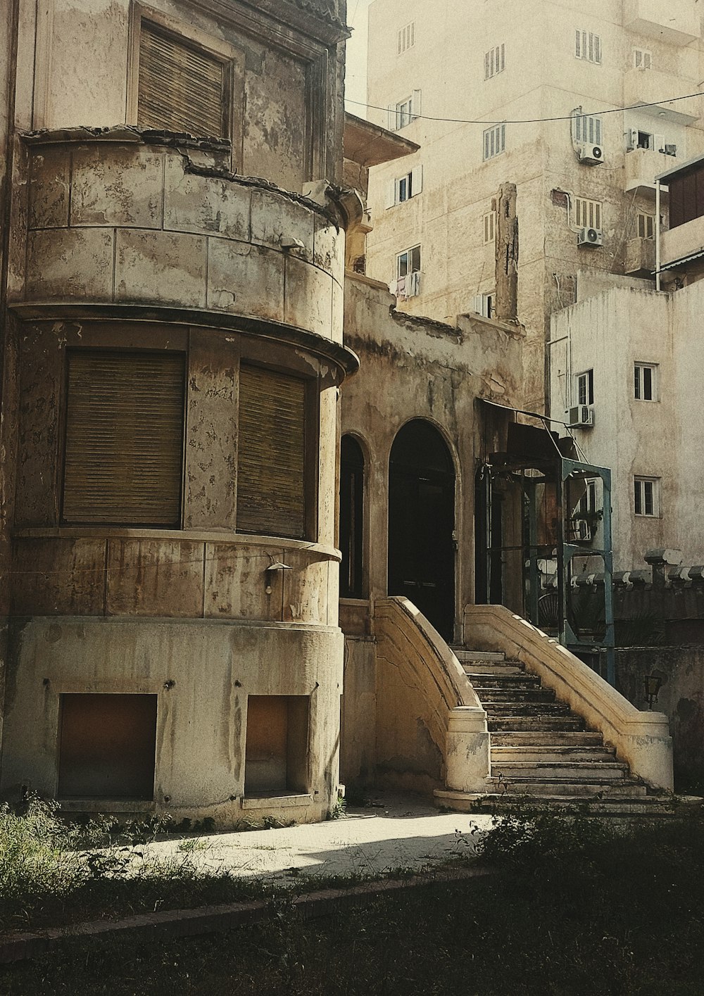 a run down building with a bunch of windows