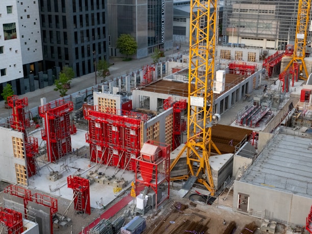 a construction site with a crane in the middle of it