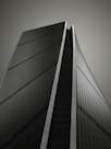 a black and white photo of a tall building