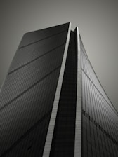 a black and white photo of a tall building