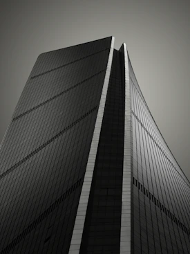 a black and white photo of a tall building