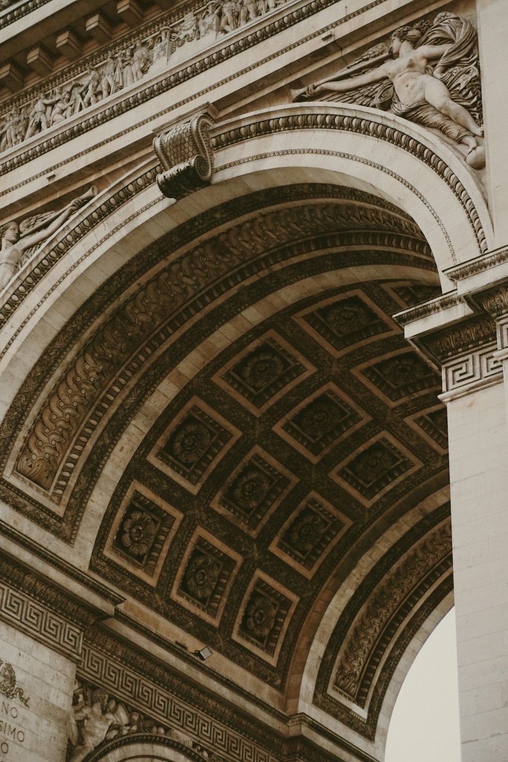 a clock mounted to the side of a building