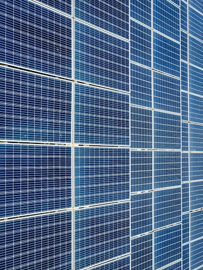 A detailed solar panel layout on a residential rooftop, showcasing precise engineering and design.