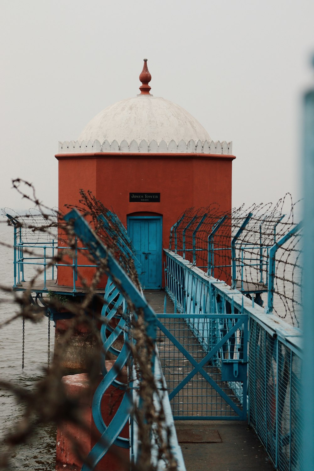 a red and blue building with a white dome