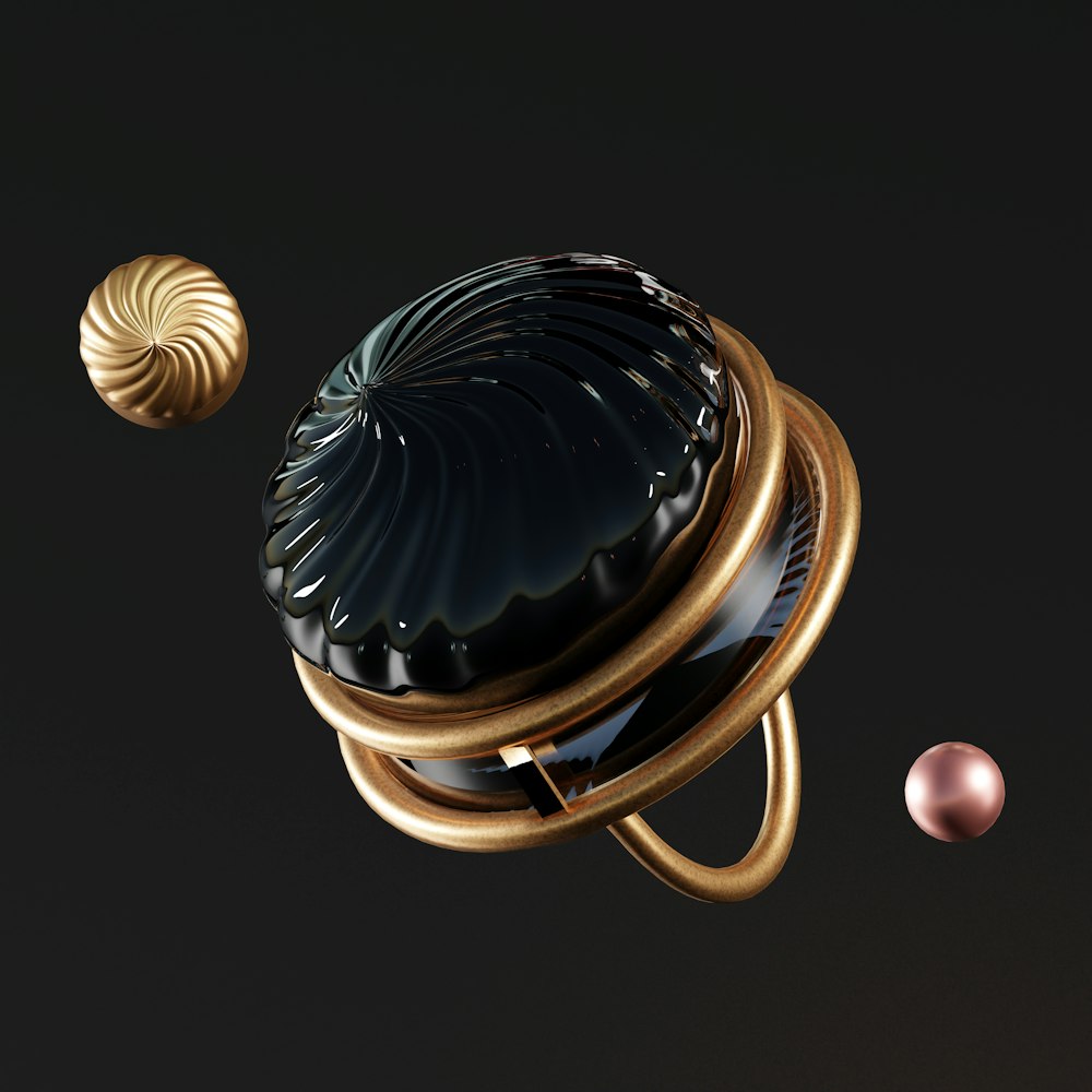 a black object with a gold ring around it