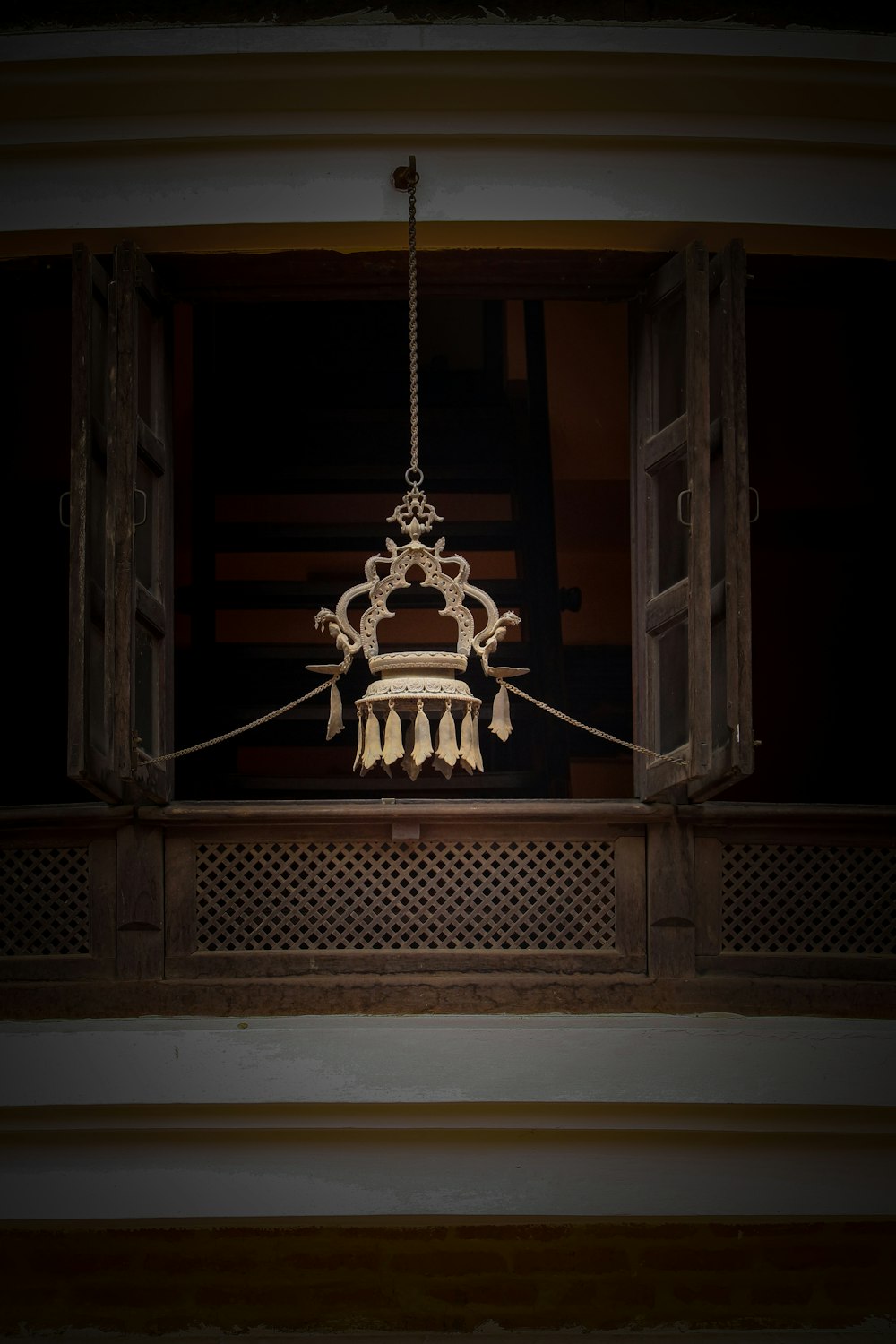 a chandelier hanging from the ceiling of a building