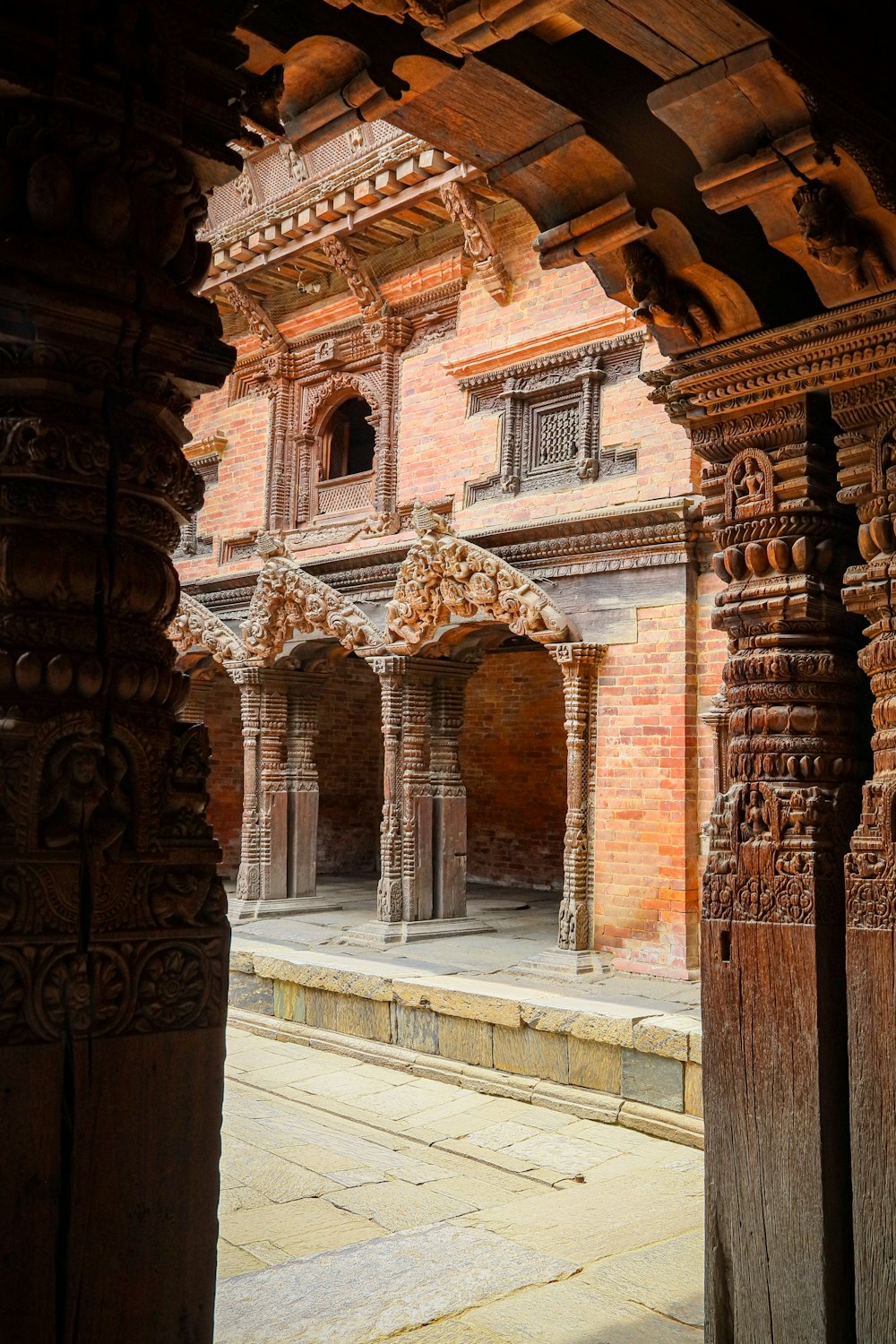 an old building with carved pillars and arches