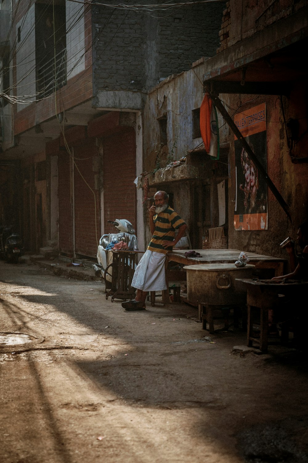 a man standing in the middle of a street