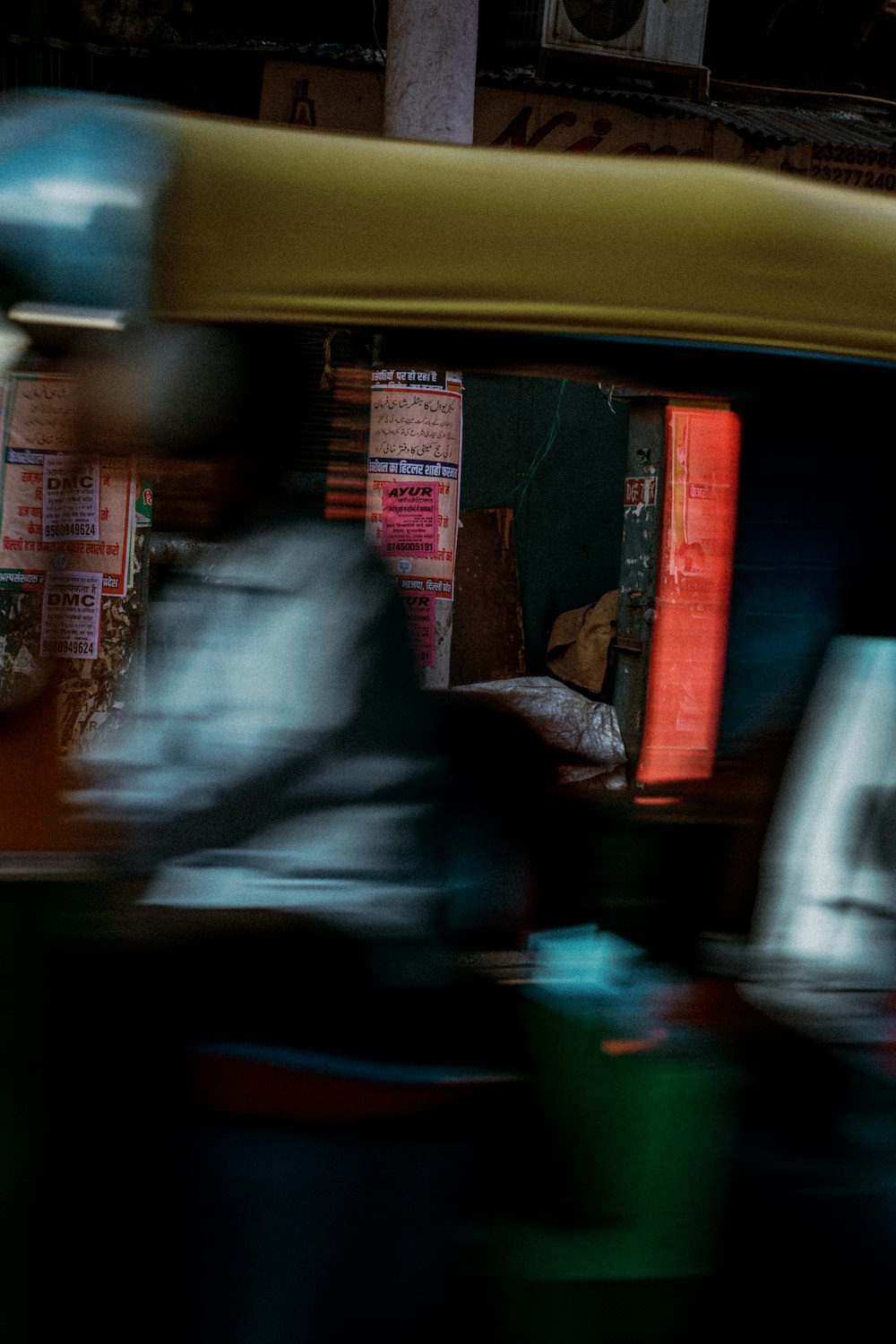 a blurry photo of a motor scooter in motion