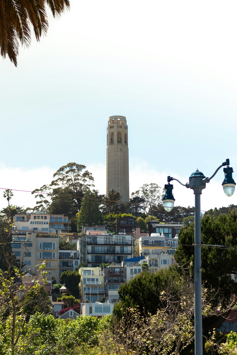 a tall tower with a clock on the top of it