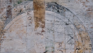 A mixed-media artwork titled 'Forgotten Places' featuring delicate gold leaf accents over textured layers, evoking memories of lost histories.