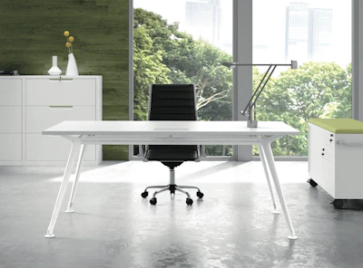 a white desk with a black chair in a room