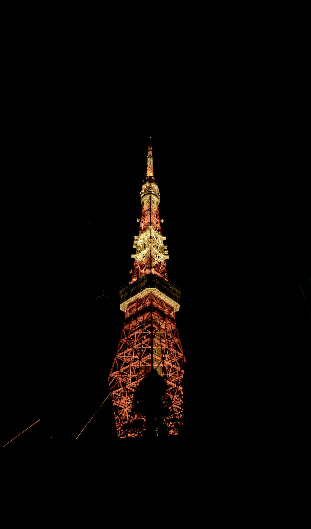 a very tall tower lit up at night