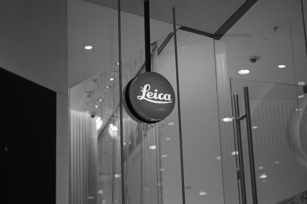 a black and white photo of a leiia sign