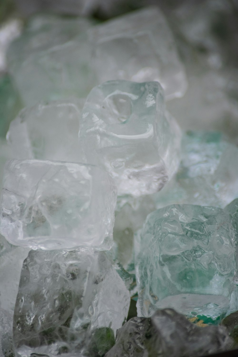 a pile of ice cubes sitting on top of a table