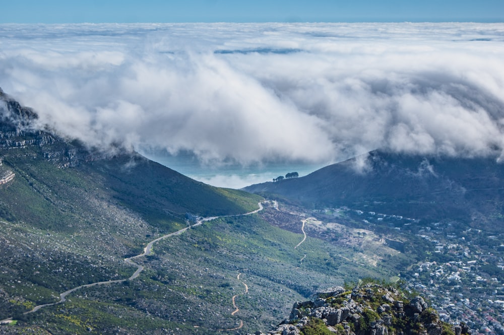 a view of a mountain with a road going through it