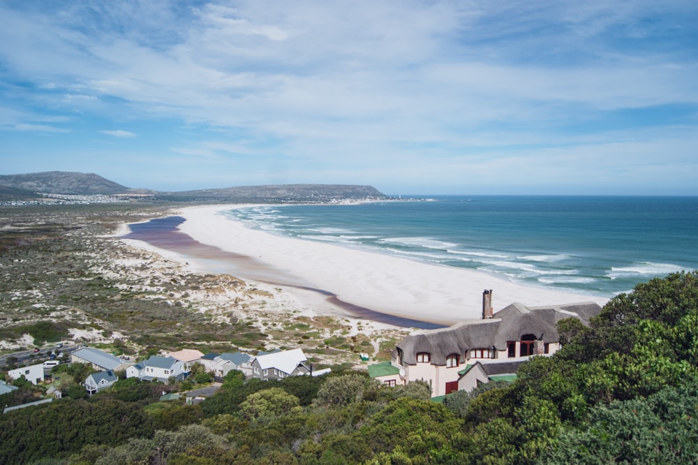 a view of a beach from a hill