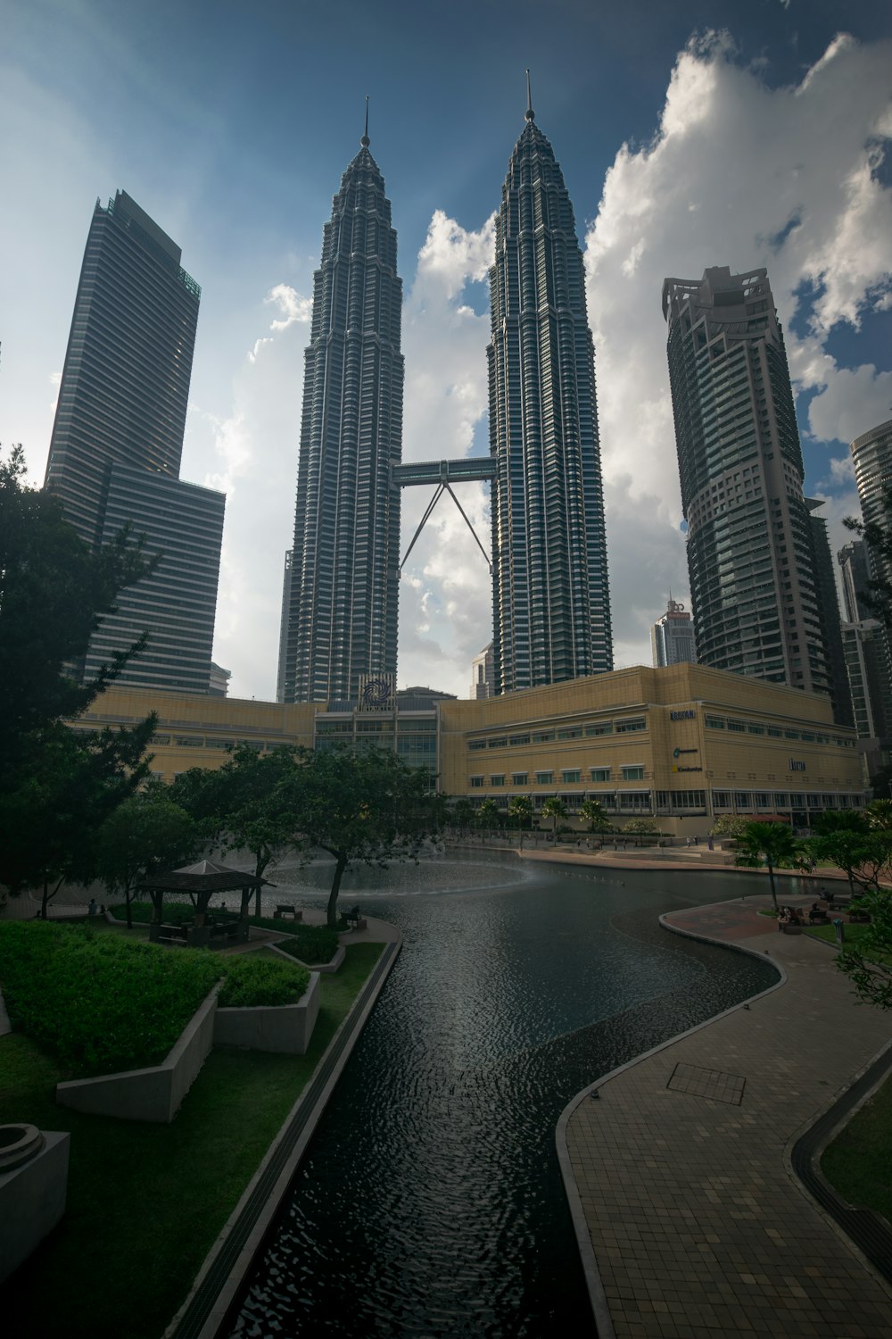 a body of water surrounded by tall buildings