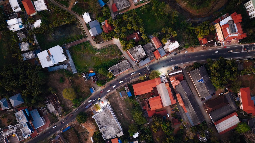 an aerial view of a street and houses