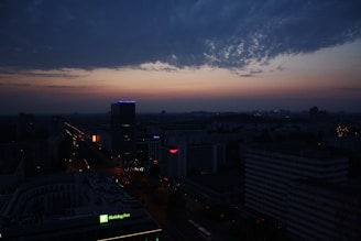 The Hot Springs cityscape at dusk with technology icons subtly overlaid to represent digital connectivity.