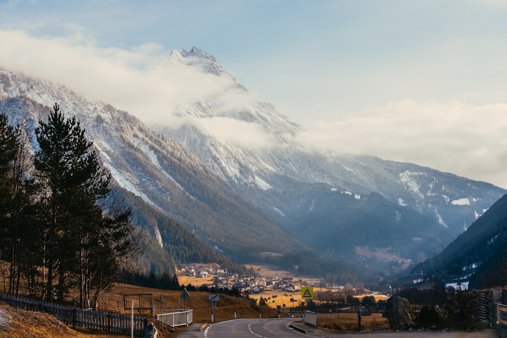 a road with a mountain in the background