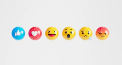 a row of different colored eggs with faces painted on them