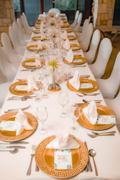 a long table set for a formal dinner