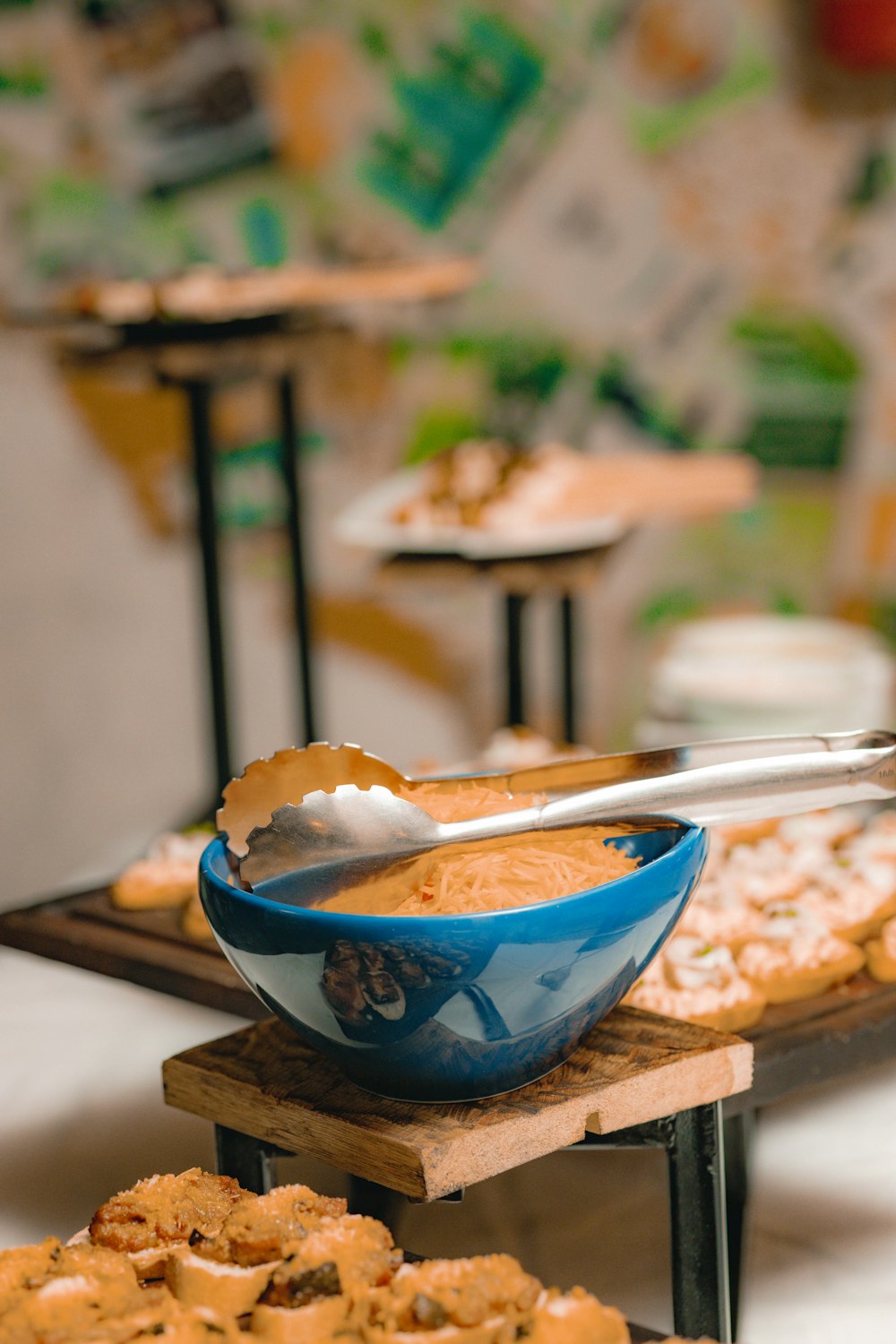 a bowl of food on a table with a spoon