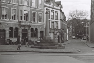 a black and white photo of a city street