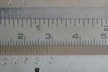 a close up of a measuring tape with numbers on it