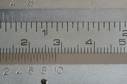 a close up of a measuring tape with numbers on it
