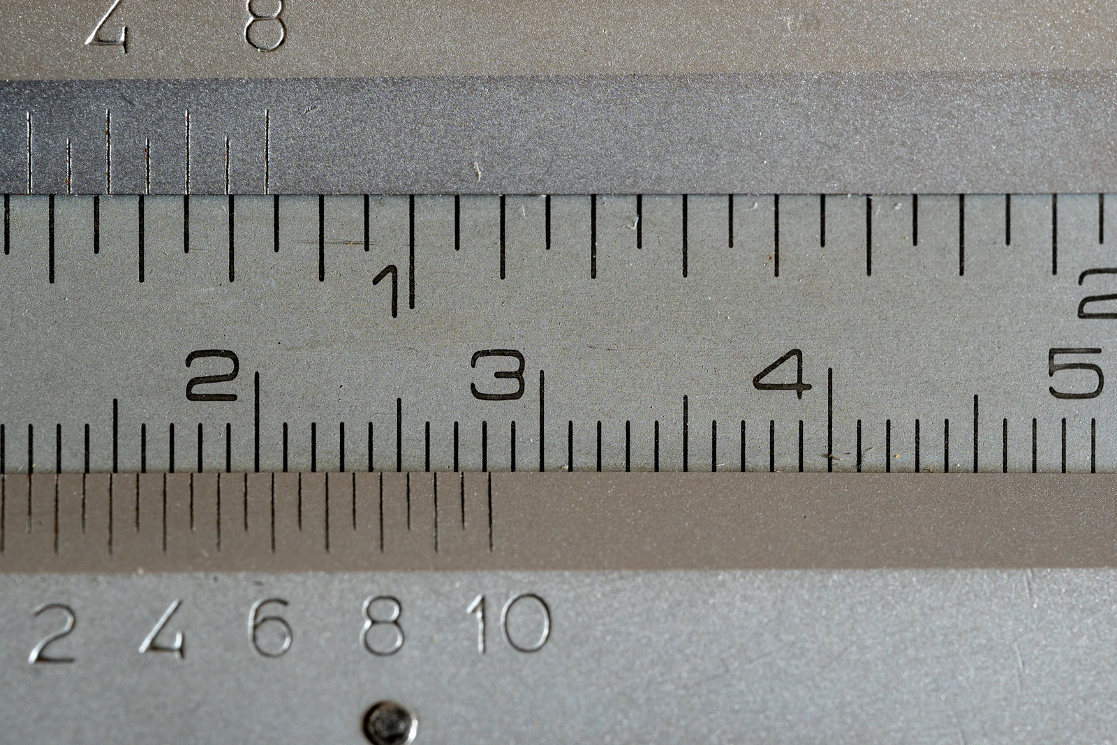 A close up of a measuring tape with numbers